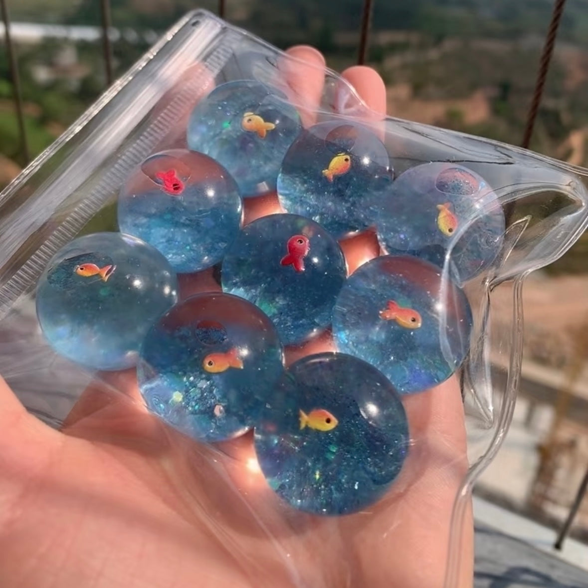 1pc/3pcs/9pcs Transparent Balls Taba Squishy Toy (fish in ball)